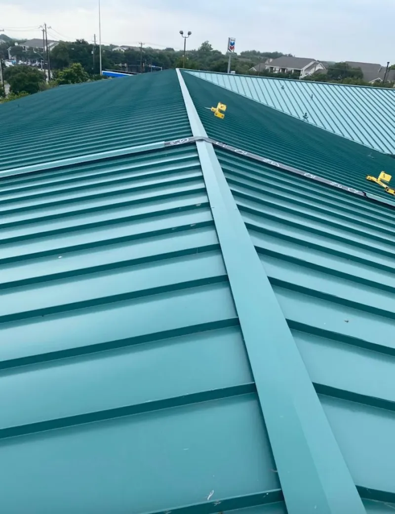 Green commercial metal roof ridge and valley for Metal Roof Repair in Middle